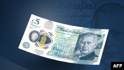 Новая британская банкнота с портретом короля Карла III (фото AFP)