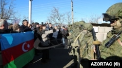 The blockade of the Lachin Corridor, which links Armenia to disputed Nagorno-Karabakh region, on December 12.