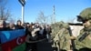 Російські військові та азербайджанські активісти у Лачинському коридорі