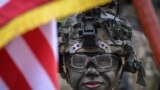 A U.S. soldier attends a military parade in Bucharest marking Romania&#39;s National Day on December 1.