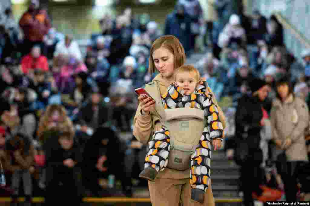 People take shelter inside a subway station during massive Russian missile attacks against Kyiv on December 29.