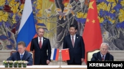 Putin and Xi attend the signing ceremony in Shanghai in 2014 for a 30-year contract for Russia to supply China with natural gas.