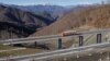 Autostrada A-1 din Muntenegru, construită în cadrul programului chinez de infrastructură BRI (Belt and Road Initiative) și finanțată de Banca chineză de Import-Export. Proiectul a lăsat guvernul de la Podgorița cu o datorie pe care nu o poate rambursa.