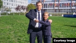 Guido Fluri (left), founder of the Justice Initiative at the Council of Europe, poses with Sirmanca Fechete, survivor of the Cighid orphanage. (Source: Justice-initiative.eu)
