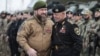 Чеченстандын башчысы Рамзан Кадыров жана ички иштер министри Руслан Алханов. 