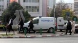 Police help evacuate a high school in Skopje due to a bomb threat, one of many that have plagued North Macedonia in recent months. (file photo)