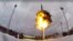 This photo taken from video provided by the Russian Defense Ministry on February 19, 2022, shows a Yars intercontinental ballistic missile being launched from an air field during military drills.