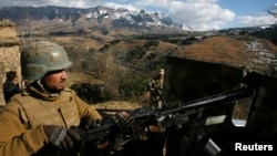 A Pakistani soldier stands guard in the Kurram tribal district. (file photo)