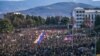 Nagorno-Karabakh - Protesters hold a giant Armenian flag as they attend a rally in Stepanakert, December 25, 2022. 