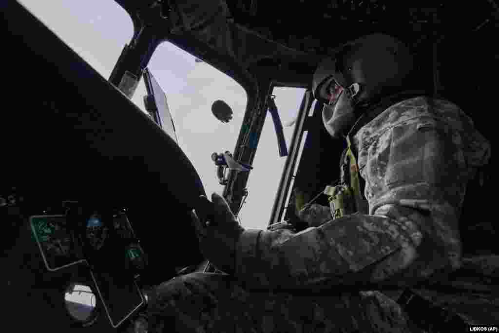 A Ukrainian pilot searches for enemy positions near the front line in the Kherson region. With a few exceptions, the donated aircraft are often the same Soviet-era models.