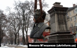 A statue of Russian poet Alexander Pushkin is dismantled in the city of Dnipro, Ukraine, on December 16, 2022.