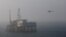 A helicopter lands on an oil platform in the Caspian Sea, east of Baku, January 22, 2013