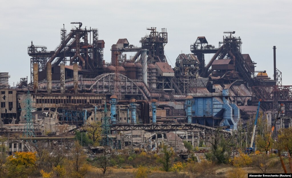 The heavily damaged Azovstal steel mill photographed on October 29. The historic Azovstal metalworks was the final holdout for members of Azov, a controversial Ukrainian regiment that previously used neo-Nazi imagery on its uniforms. Russian President Vladimir Putin initially claimed "de-Nazification" as a justification of the February invasion of Ukraine, but the Kremlin has more recently framed the conflict as a war against "satanism."