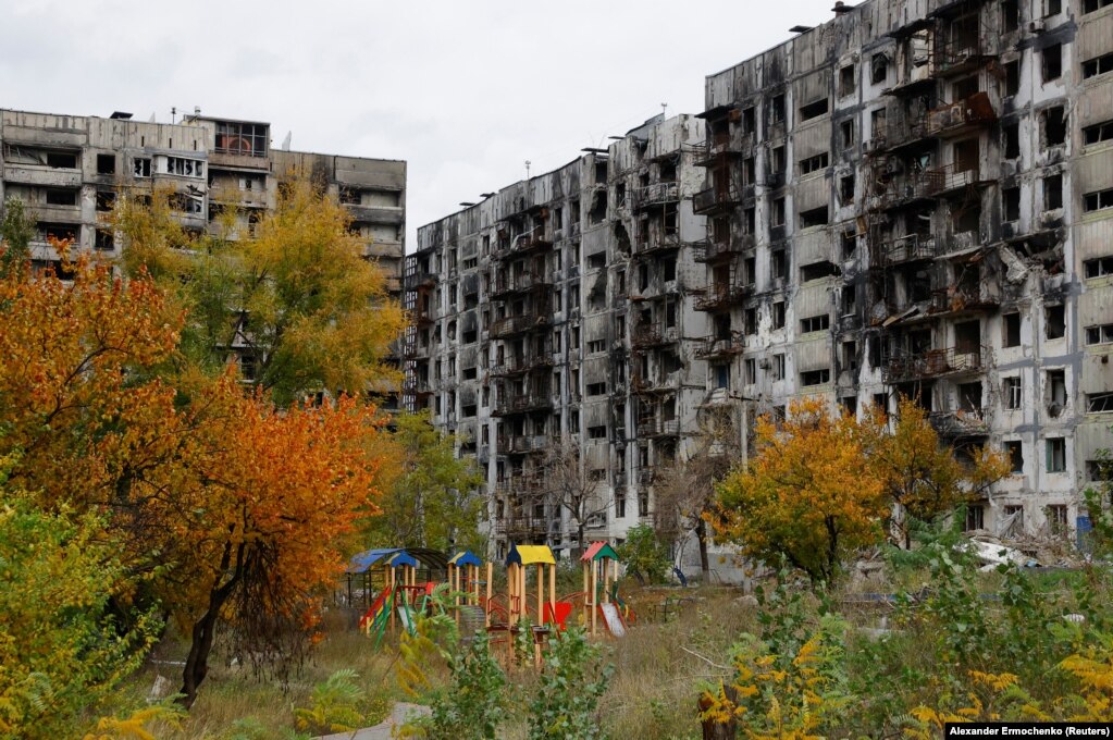 A child's playground in the courtyard of a ruined apartment block on October 29.  Mariupol was once home to around 431,000 people. Less than a quarter of that number are estimated to remain in the city today. 