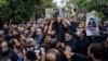 At least 15 people were killed on October 26 in an attack on a key Shi'ite Muslim shrine in southern Iran, with IS claiming responsibility for the assault.