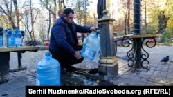 In Kyiv, as a result of Russian shelling of infrastructure, the water supply has disappeared in many areas of the city. Here, people collect water near one of the pumping stations in the central part of the city on October 31.
