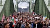 Protesters walks across Budapest&rsquo;s Liberty Bridge on October 23.<br />
<br />
The crowd of thousands was one of the biggest protests Viktor Orban&#39;s government has faced. The protesters were brought together over a variety of issues, including conditions for teachers and the severe economic situation in Hungary.&nbsp;
