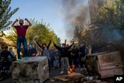 Iranians protests Amini's death, in Tehran on October 27, 2022.