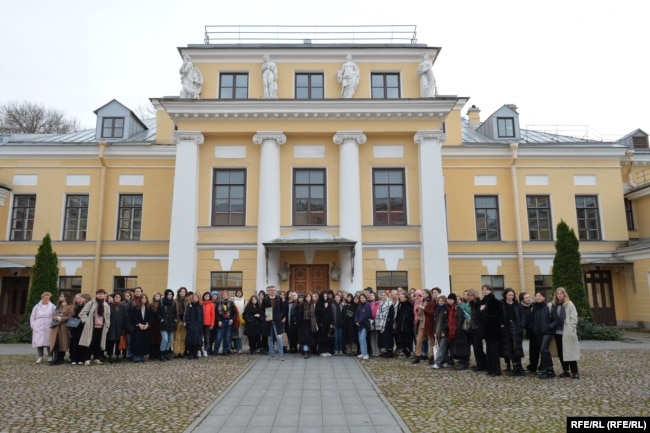 Denis Skopin poses with his students at St. Petersburg State University after being dismissed.