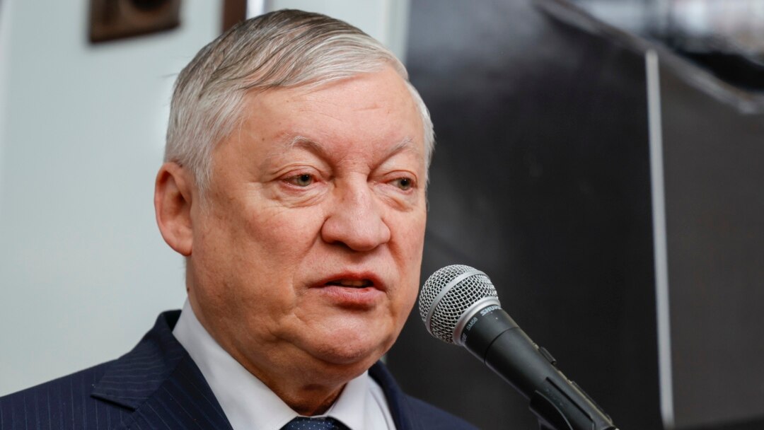 World chess champion Anatoly Karpov right with son at a walk Stock