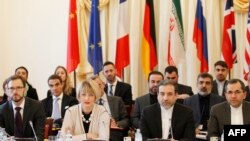 Austria -- Helga Schmid, deputy secretary-general for the external action services of EU, Iranian deputy foreign ministers Seyed Abbas Araqchi (2ndR) and Majid Takht Ravanchi (L) of Joint Comprehensive Plan of Action (JCPOA), the Joint Commission are pi