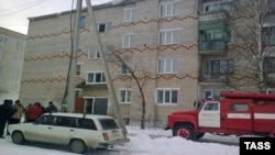 A residential building where nine people, including seven children, died in a fire in the central city of Perm early on March 9.