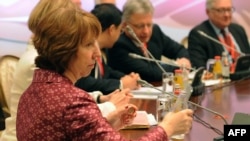 EU foreign policy chief Catherine Ashton (foreground) takes part in talks on Iran's nuclear program in Almaty on April 5. 