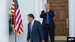 Mitt Romney (sağda)