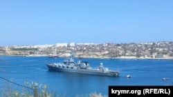 The missile cruiser Moskva of the Black Sea Fleet is seen anchored in Sevastopol Bay on April 10.