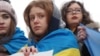 Участницы антивоенного митинга в поддержку Украины в Варшаве