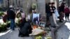 People gather at a memorial dedicated to the events of April 9, 1989, in Tbilisi.