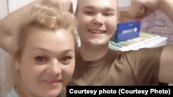 Anastasia Avrova poses for a selfie with her son, Nikita Avrov, who died in combat in Ukraine.