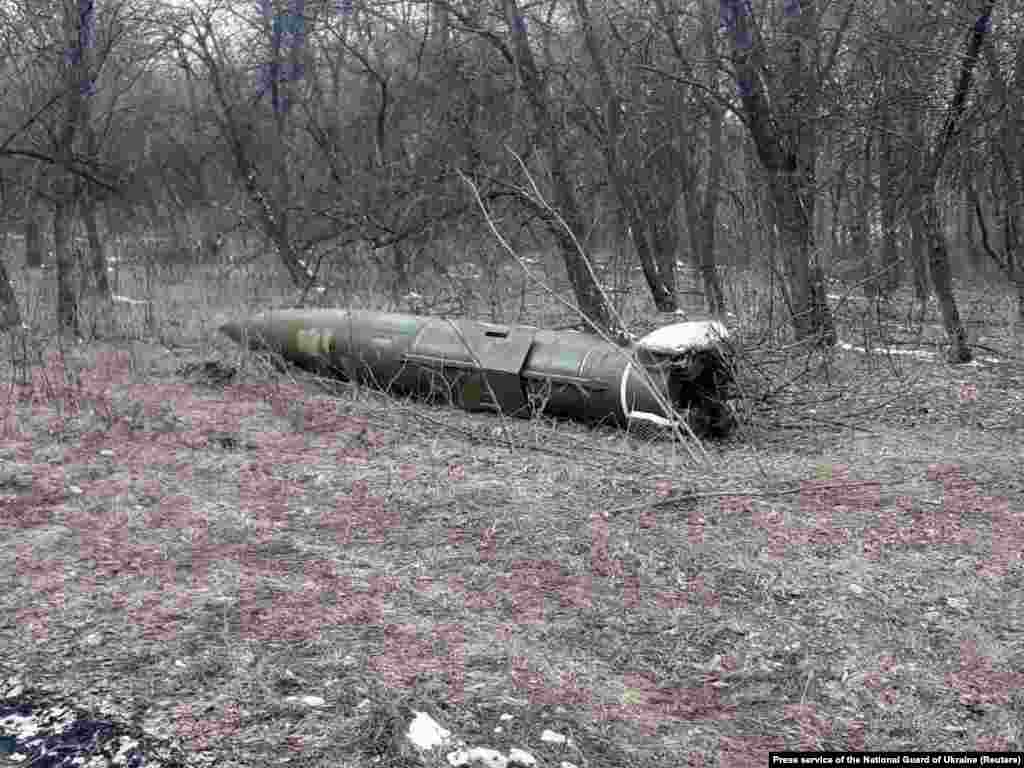 An unexploded Tochka missile is seen after crashing to Earth near Kramatorsk on March 9. Such missiles are capable of carrying a warhead of high explosive weighing nearly half a ton.&nbsp;&nbsp;