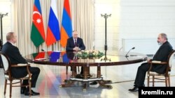 Russian President Vladimir Putin (center) meets with Azerbaijani President Ilham Aliyev (left) and Armenian Prime Minister Nikol Pashinian in Sochi in October 2022.