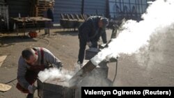 As Russia Targets Ukraine's Power Grids, Volunteers Build Stoves
