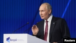 Russia - Russian President Vladimir Putin delivers a speech during the 19th Annual Meeting of the Valdai Discussion Club in Moscow, October 27, 2022.