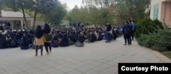 Students at the Hamadan University of Technology hold a sit-in.