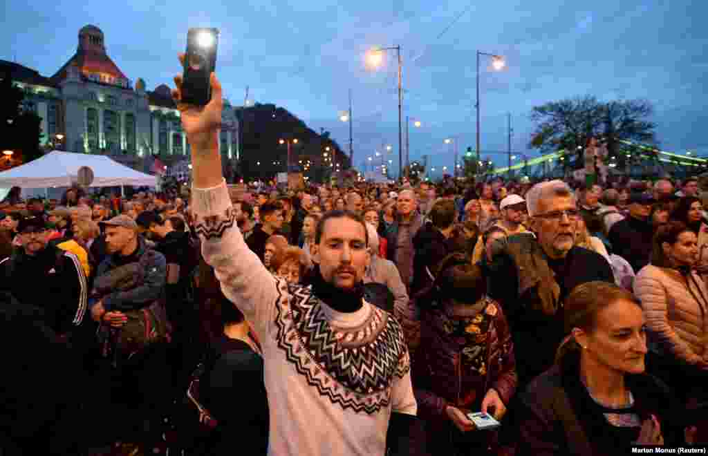 Protesters in Budapest on the evening of October 23. One man in the crowd told Reuters: &quot;This runaway inflation.... We cannot save up at all anymore. Simply, we cannot make ends meet as prices are soaring.&quot;