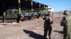 Turkey - An Armenian officer (L) inspects a Turkish military base near Kars, 28Nov2012. 