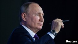 Рускиот претседател Владимир Путин за време на неговата годишна прес-конференција во Москва на 23 декември.