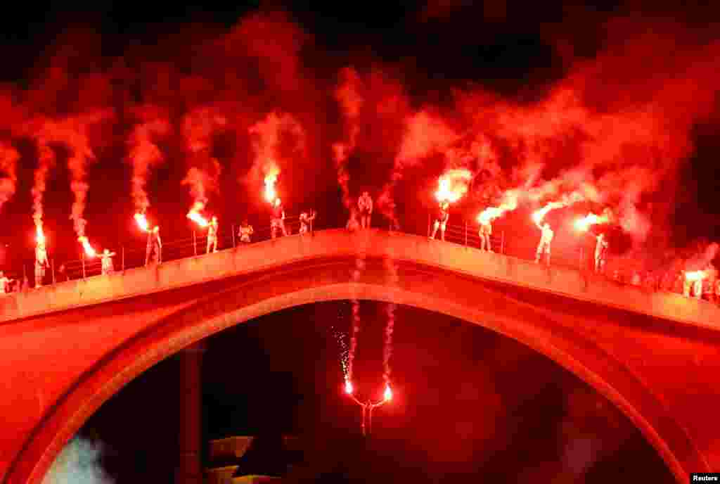 A man jumps from the Old Bridge in Mostar, Bosnia-Herzegovina. (Reuters/Dado Ruvic)