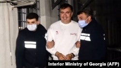 Former Georgian president Mikheil Saakashvili being detained in Georgia on October 1, 2021