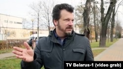 U.S. citizen Evan Neumann give an interview to a Belarusian TV station in November. 