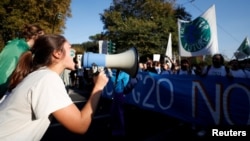 Activiștii de mediu au organizat un protest față de lipsa de decizii concrete a liderilor lumii în legătură cu schimbările climatice. 