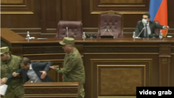 Armenia - Security officers remove opposition deputy Gegham Manukian from the parliament podium, Օctober 26, 2021