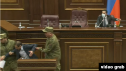 Armenia - Security officers remove opposition deputy Gegham Manukian from the parliament podium, Օctober 26, 2021