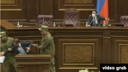 Armenia - Security officers remove opposition deputy Gegham Manukian from the parliament podium, Օctober 26, 2021