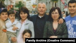 An undated photo of Kadyr Yusupov (center) and his family.