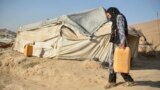 AFGHANISTAN-CLIMATE-CONFLICT-POVERTY-GIRLS