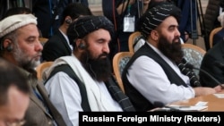 راست به چپ- امیرخان متقی سرپرست وزارت خارجه حکومت طالبان